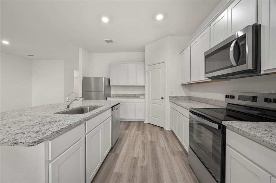 Furnished interior view inside a new home in , Poinciana (Image 8).