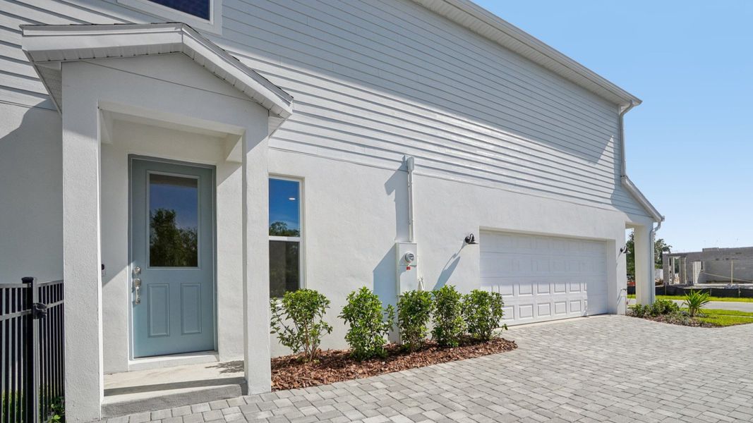 The Front Door and 2 Car Garage