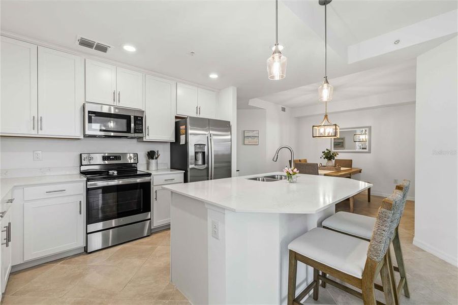 Furnished interior view inside a new home in Wellen Park Golf & Country Club, Venice (Image 16).