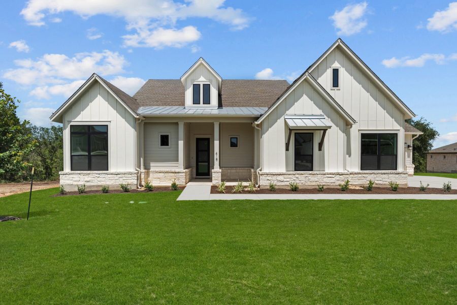 Representative exterior photo of a completed home built from the The Norwood by David Weekley Homes in Rees Landing Estates, Spicewood, TX (Image 1). Representative exterior photo of a completed home built from the The Norwood by David Weekley Homes in Rees Landing Estates, Spicewood, TX (Image 1).