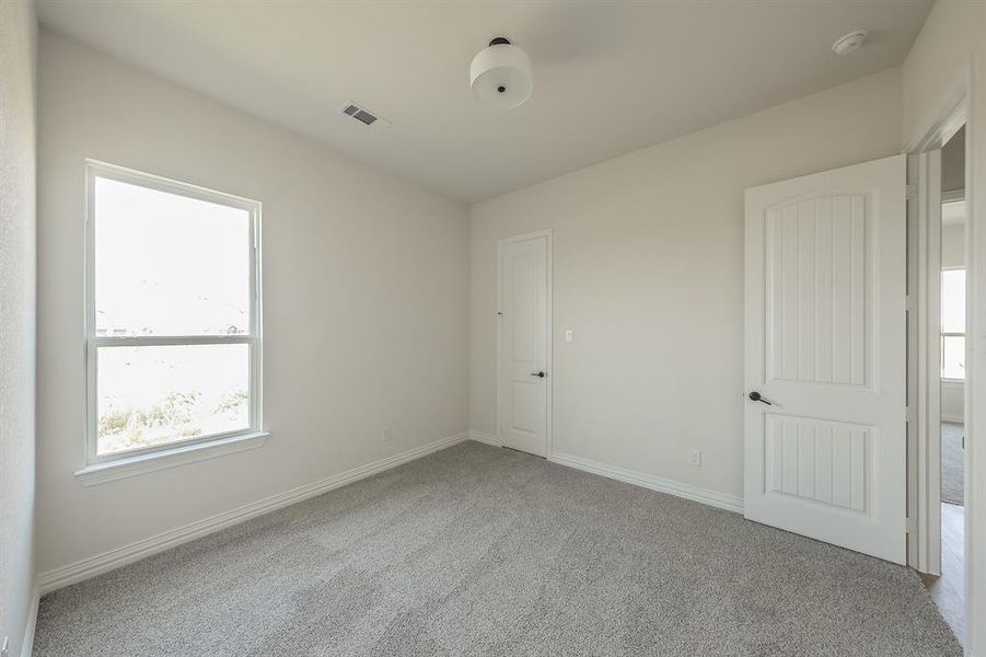 Spacious, unfurnished interior of a new home in Matthews Farms, Venus (Image 26).