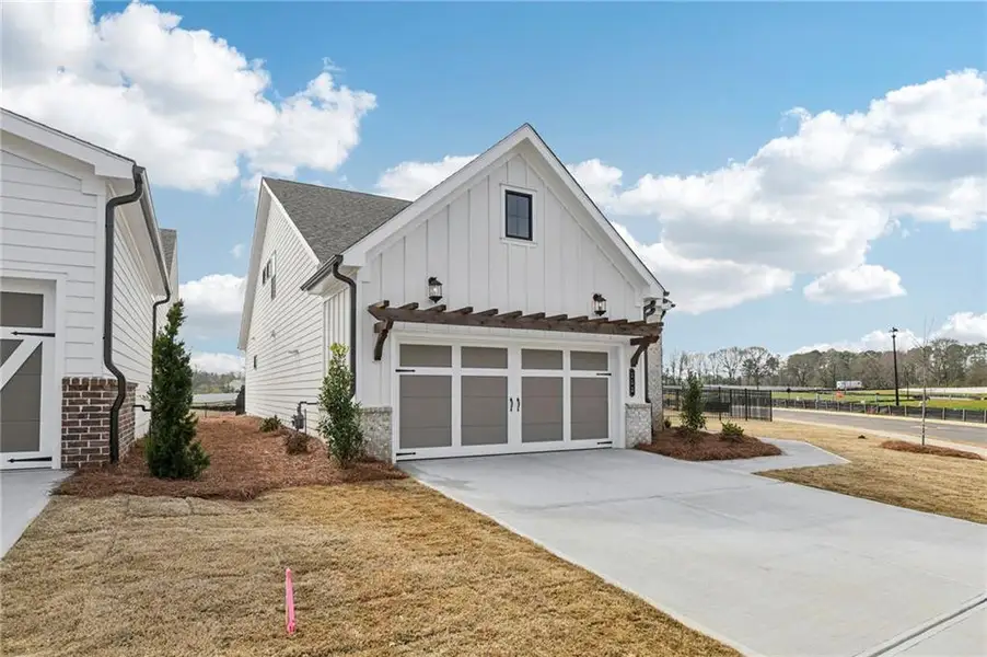 Front exterior of a new home in Aberdeen, Hoschton, GA, highlighting curb appeal (Image 19).