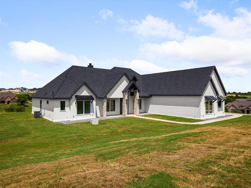 Front exterior of a new home in , Fort Worth, TX, highlighting curb appeal (Image 1). Front exterior of a new home in , Fort Worth, TX, highlighting curb appeal (Image 1).