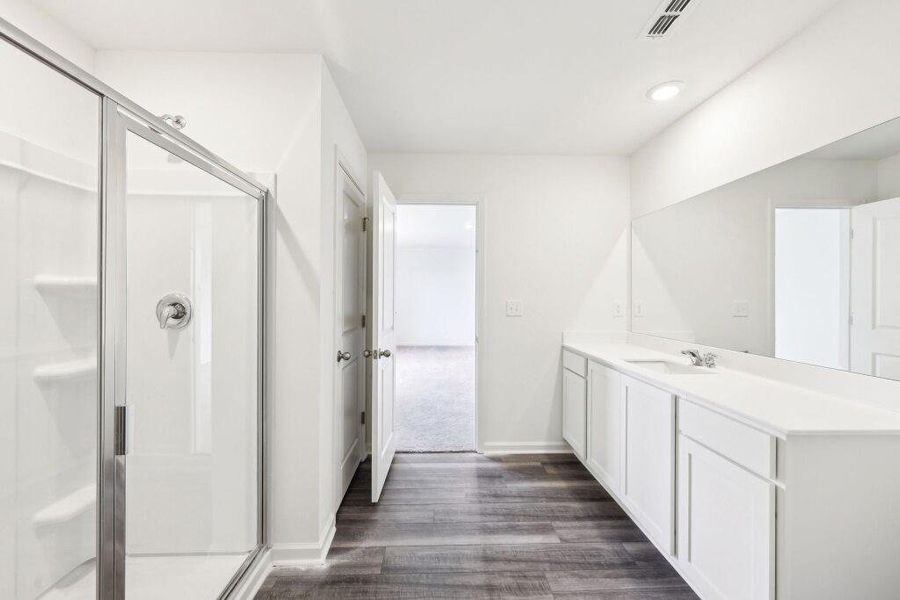 Furnished interior view inside a new home in Sunterra Lakes, Brookshire (Image 6).