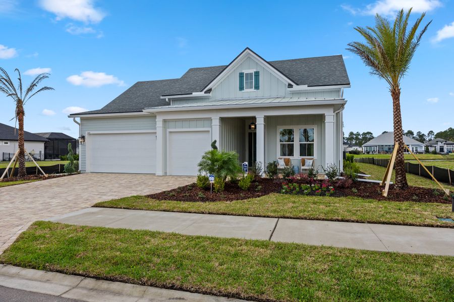 Front exterior of a new home in Amelia National Country Club, Fernandina Beach, FL, highlighting curb appeal (Image 25).