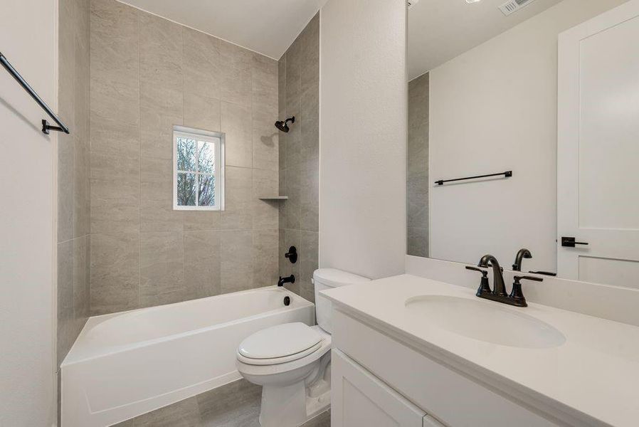 Furnished interior view inside a new home in Monterra, Fate (Image 9).