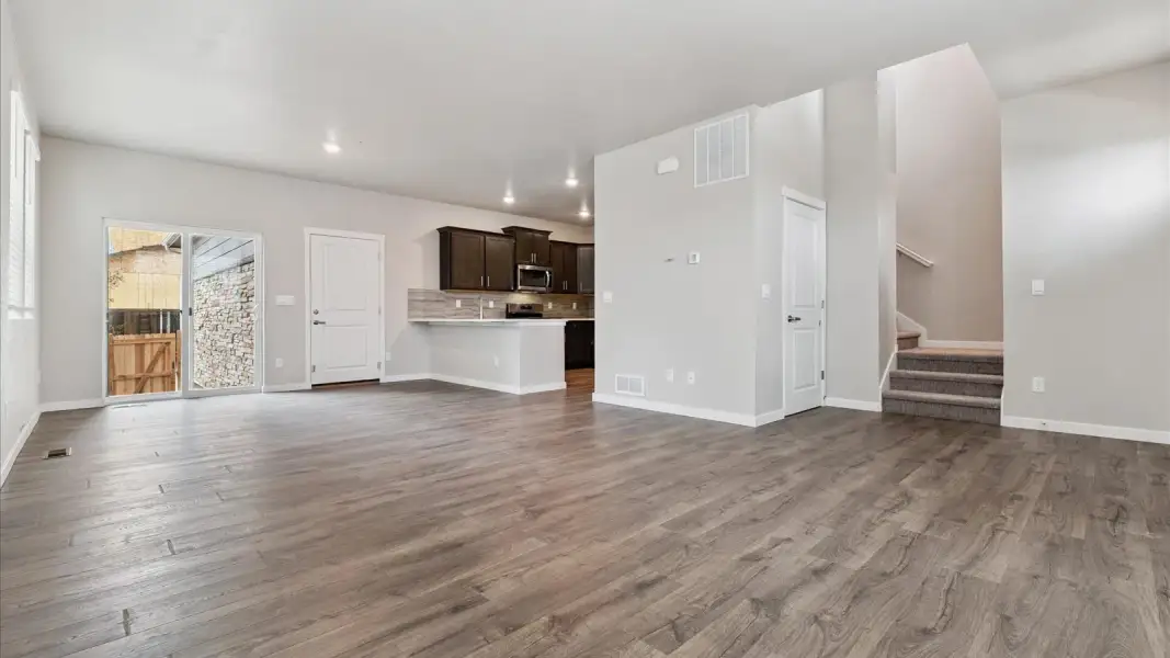 Spacious, unfurnished interior of a new home in Sky Ranch, Watkins (Image 10).