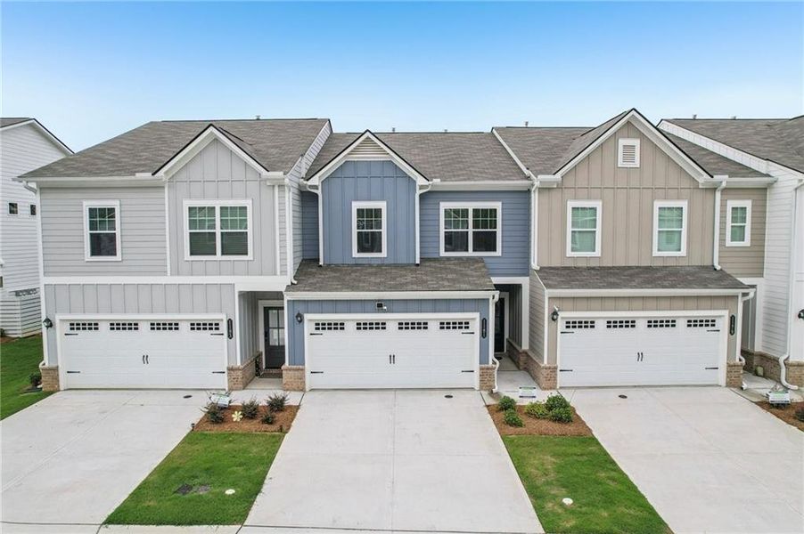 Front exterior of a new home in Ellison Square, Sugar Hill, GA, highlighting curb appeal (Image 20).