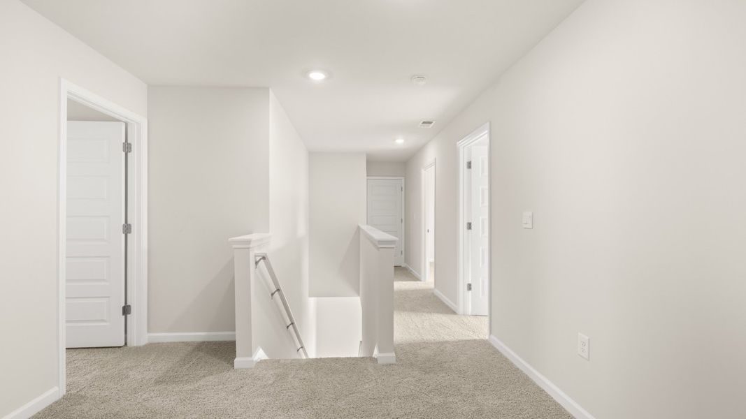 Spacious, unfurnished interior of a new home in The Reserve at Calcutta, Stockbridge (Image 16). Spacious, unfurnished interior of a new home in The Reserve at Calcutta, Stockbridge (Image 16).