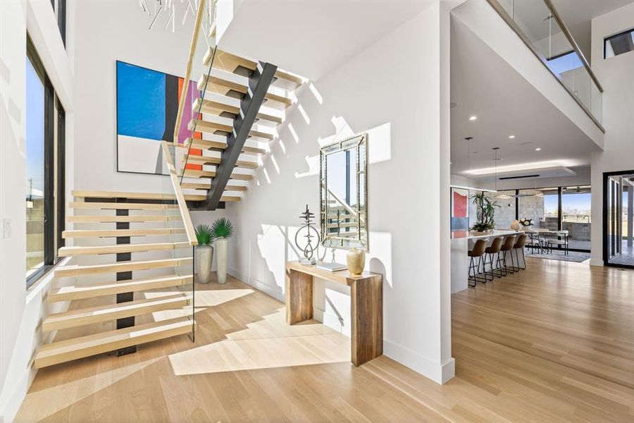 Bright landing with floating staircase detail. Bright landing with floating staircase detail.