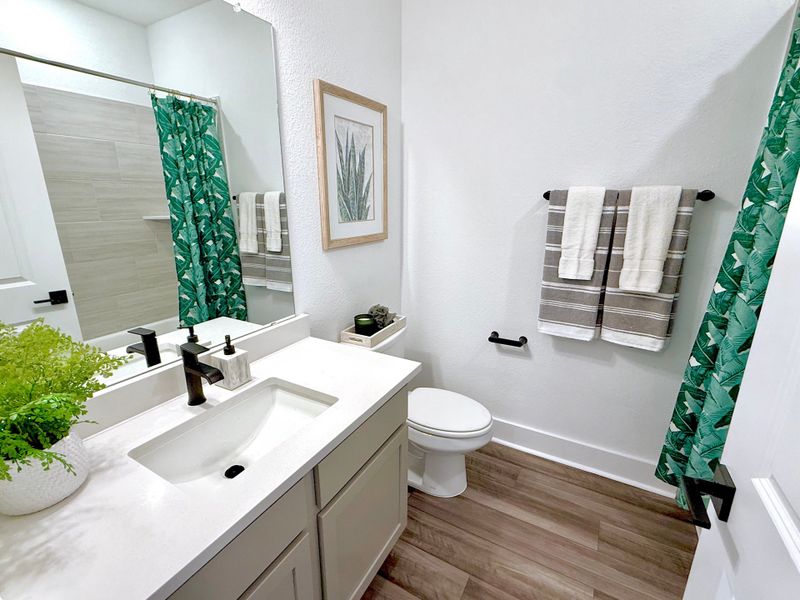 Furnished interior view inside a new home in Sage Collection – Freedom at Anthem, Kyle (Image 12).