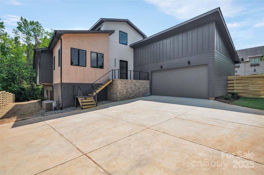 Front exterior of a new home in , Charlotte, NC, highlighting curb appeal (Image 19). Front exterior of a new home in , Charlotte, NC, highlighting curb appeal (Image 19).
