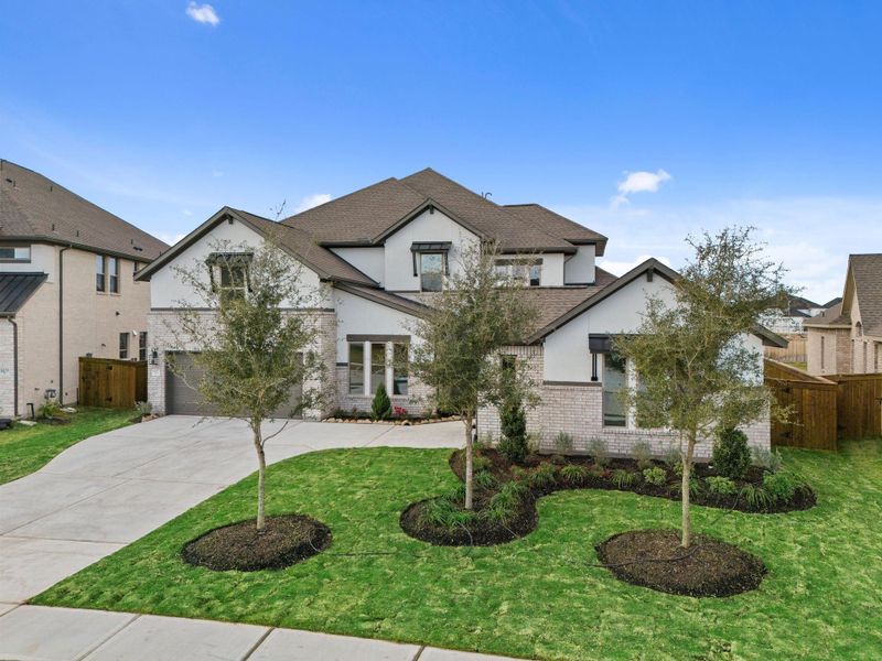 Front exterior of a new home in Dunham Pointe 70', Cypress, TX, highlighting curb appeal (Image 21).