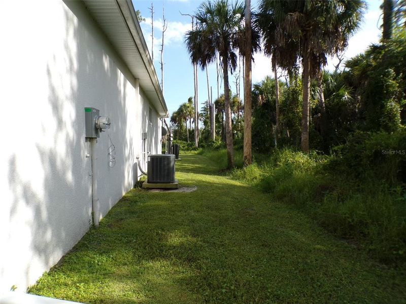 Exterior details and patio area of a home in , North Port (Image 27).