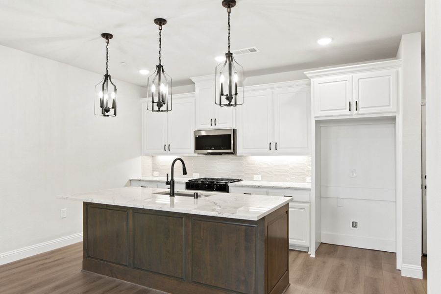 Furnished interior view inside a new home in The Tribute, The Colony (Image 7).