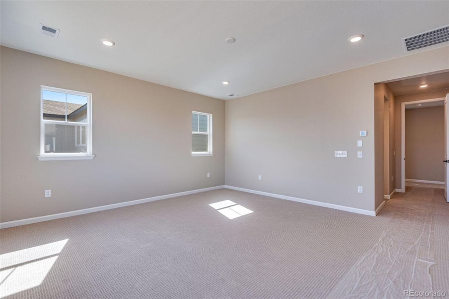 Spacious, unfurnished interior of a new home in Ensemble at The Aurora Highlands, Aurora (Image 36). Spacious, unfurnished interior of a new home in Ensemble at The Aurora Highlands, Aurora (Image 36).