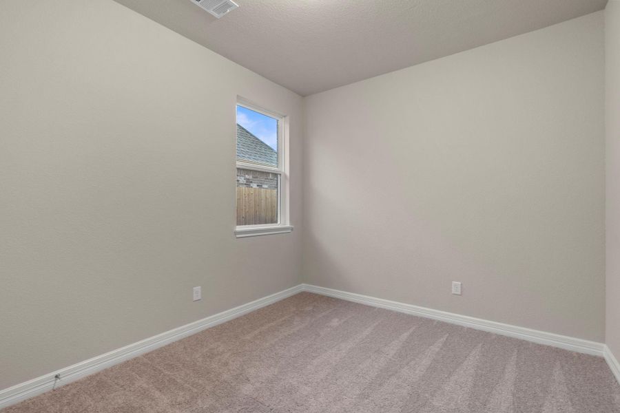 Your secondary bedroom features plush carpet, fresh paint, closet, and a large window that lets in plenty of natural lighting. Your secondary bedroom features plush carpet, fresh paint, closet, and a large window that lets in plenty of natural lighting.