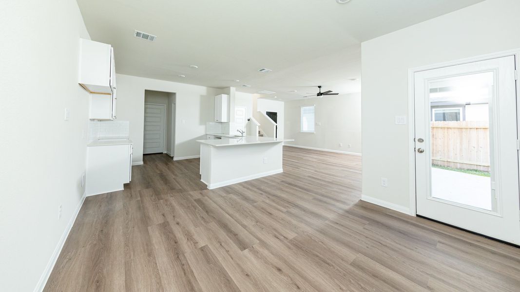 Dining Area to Kitchen and Family Room