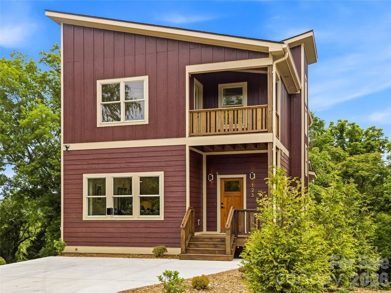 Front exterior of a new home in , Asheville, NC, highlighting curb appeal (Image 29).