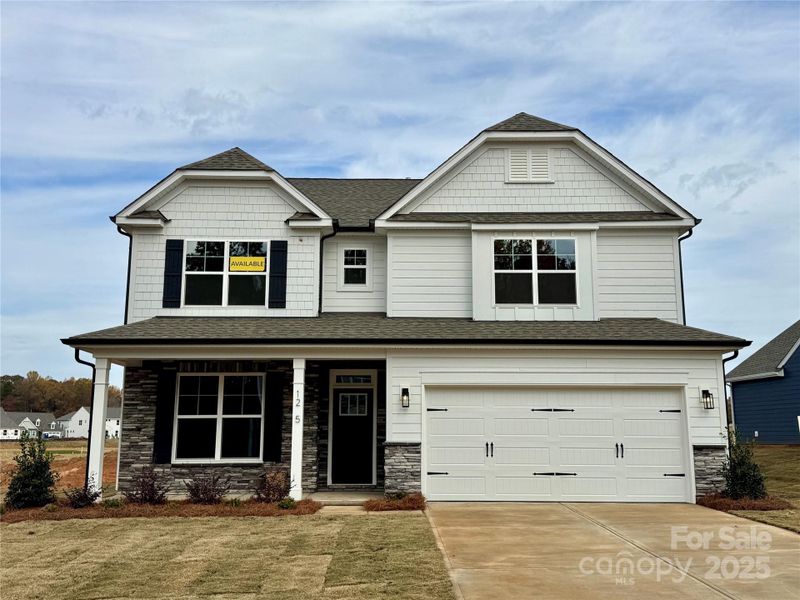 Front exterior of a new home in Carrington, Stanley, NC, highlighting curb appeal (Image 24).