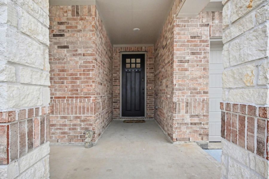 Exterior details and patio area of a home in Centennial Oaks, Santa Fe (Image 3).