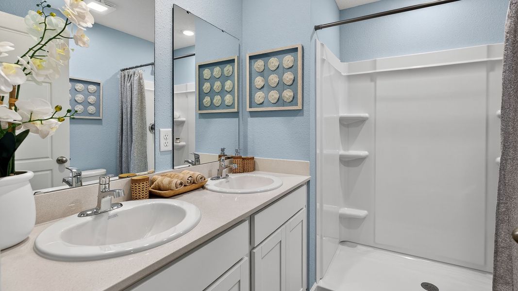Representative furnished interior of a home built from the Greyson II by D.R. Horton in Irongate Villas, Jacksonville (Image 17).