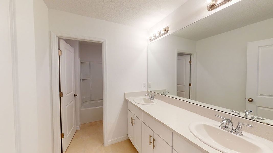 Representative furnished interior of a home built from the Azalea by Taylor Morrison in Riverfront, Edgewater (Image 7).