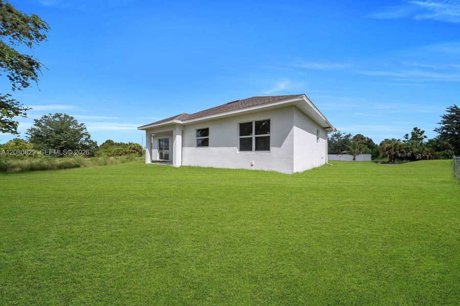 Exterior details and patio area of a home in , Lehigh Acres (Image 20).