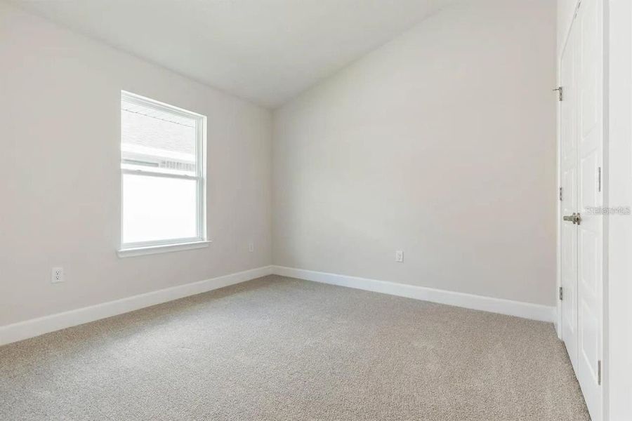 Representative unfurnished interior of a home built from the 1512 by Adams Homes in Winding Oaks, Weeki Wachee (Image 15).