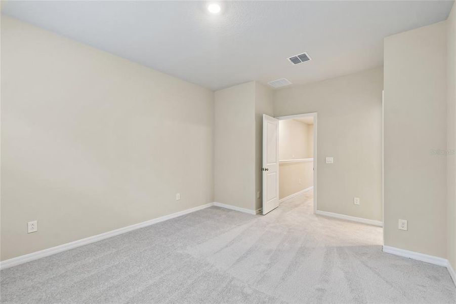Spacious, unfurnished interior of a new home in Preserve at The Cays – The Harbor Series, Daytona Beach (Image 10). Spacious, unfurnished interior of a new home in Preserve at The Cays – The Harbor Series, Daytona Beach (Image 10).
