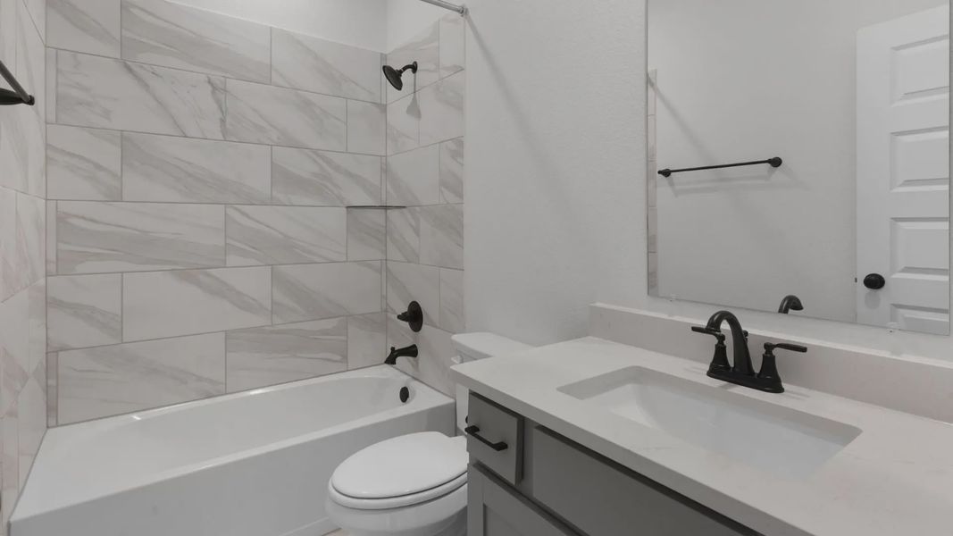 Representative furnished interior of a home built from the Aventura by Chesmar Homes in Parkside on the River, Georgetown (Image 5).