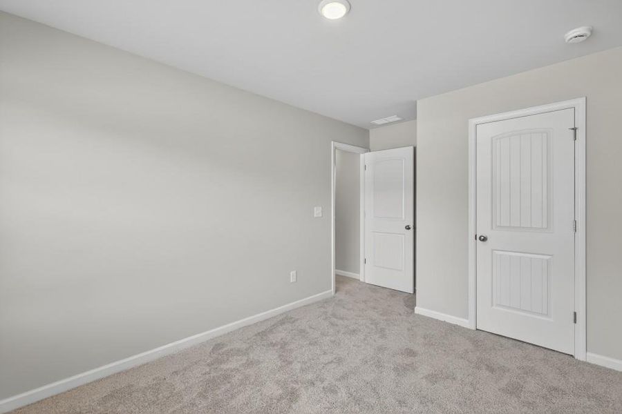 Spacious, unfurnished interior of a new home in The Reserve At Clock Tower, Douglasville (Image 32).