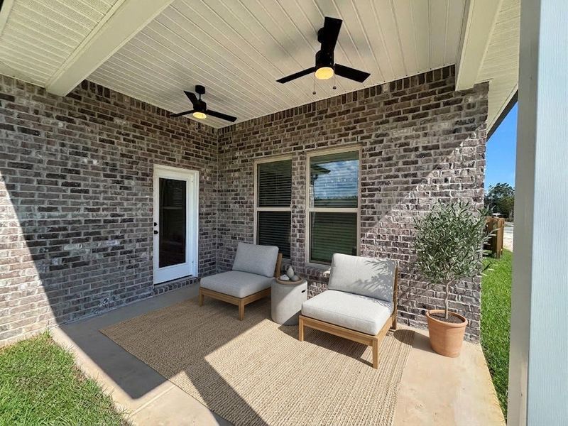Exterior details and patio area of a home in Bird Song at Hammock Bay, Freeport (Image 3).