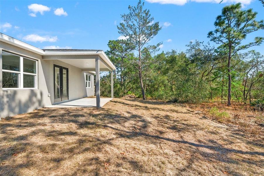 Exterior details and patio area of a home in , Citrus Springs (Image 3).