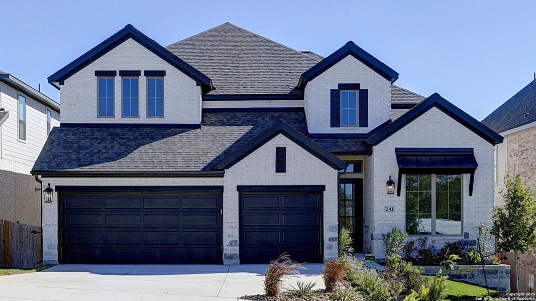 Front exterior of a new home in Ranches At Creekside 55', Boerne, TX, highlighting curb appeal (Image 1).