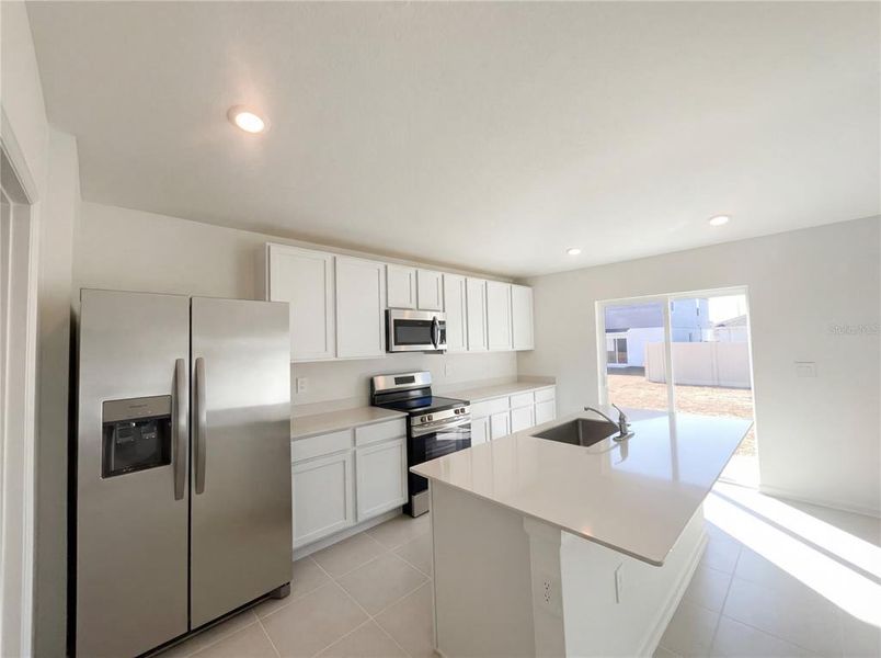 Furnished interior view inside a new home in Peace Creek Reserve, Winter Haven (Image 7).