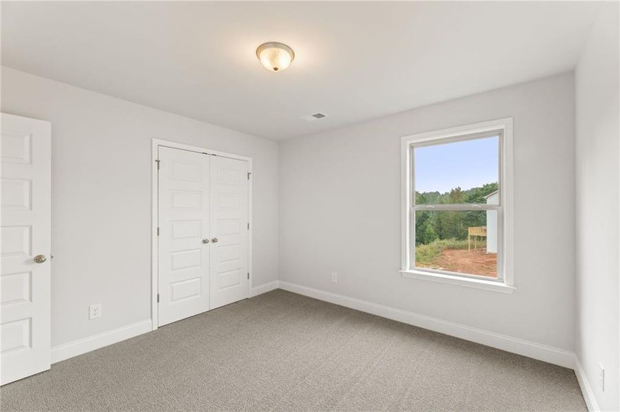 Spacious, unfurnished interior of a new home in Hellen Valley, Braselton (Image 24).