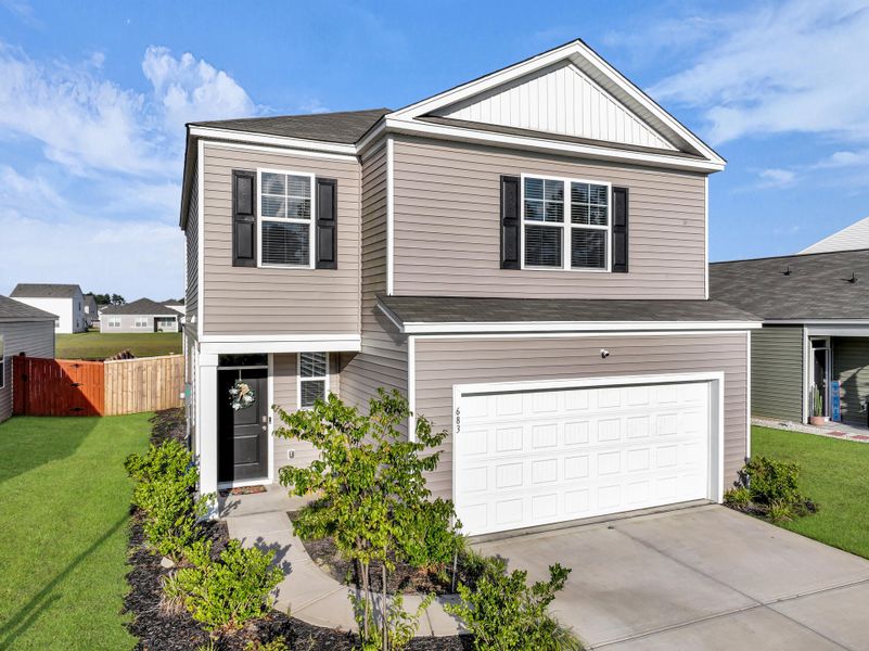 Front exterior of a new home in , Summerville, SC, highlighting curb appeal (Image 22).