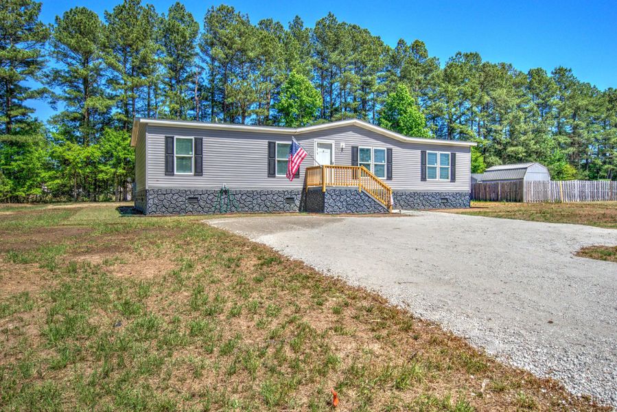 Exterior details and patio area of a home in , Orangeburg (Image 25).
