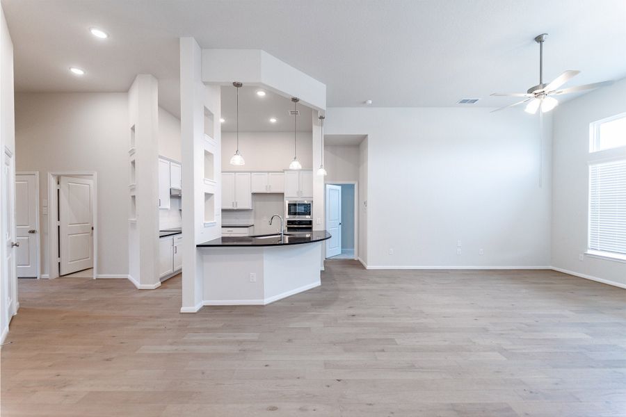 Spacious, unfurnished interior of a new home in The Woodlands at Medina Hills, Mico (Image 12).