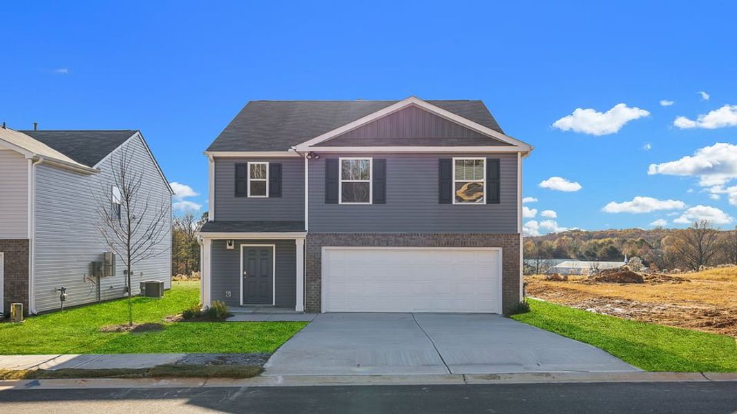 Front exterior of a new home in Cloverdale Hills, Piedmont, SC, highlighting curb appeal (Image 1). Front exterior of a new home in Cloverdale Hills, Piedmont, SC, highlighting curb appeal (Image 1).