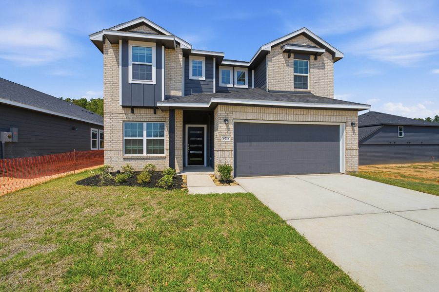 Front exterior of a new home in Magnolia Springs, Montgomery, TX, highlighting curb appeal (Image 20).