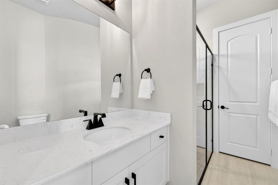 Furnished interior view inside a new home in Light Farms Graham/Reagan, Celina (Image 13).