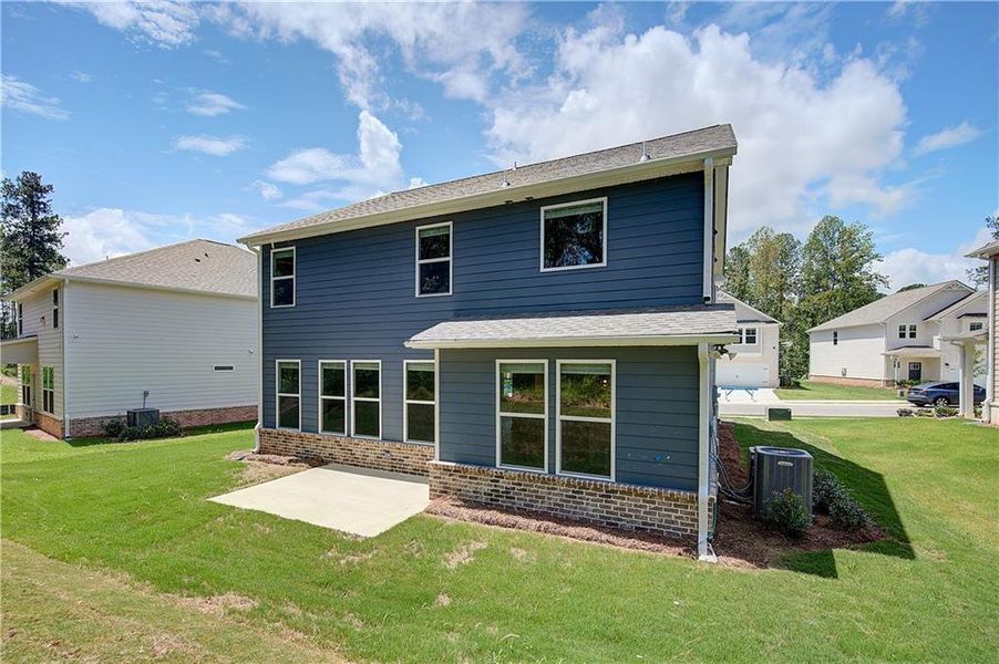 Front exterior of a new home in Westminster, Covington, GA, highlighting curb appeal (Image 14).