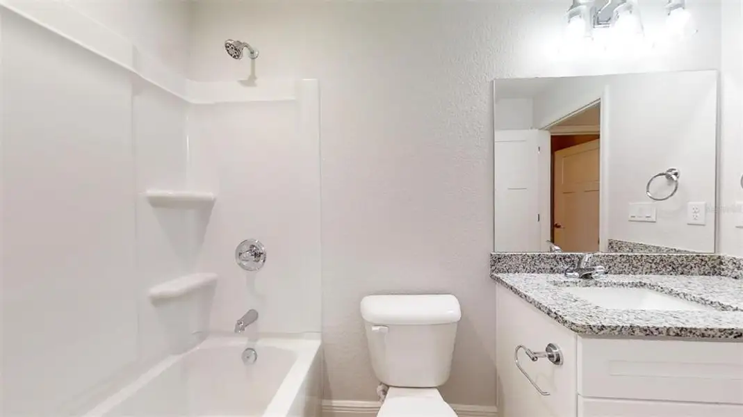 Furnished interior view inside a new home in , Dunnellon (Image 4).
