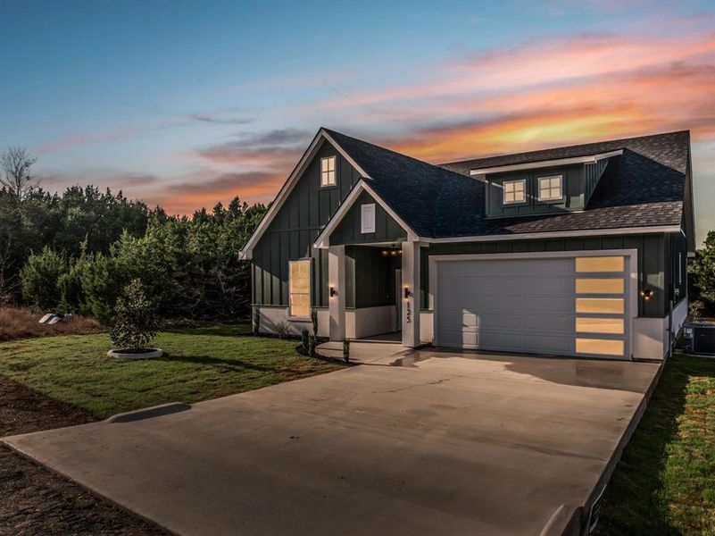 Front exterior of a new home in , Whitney, TX, highlighting curb appeal (Image 2). Front exterior of a new home in , Whitney, TX, highlighting curb appeal (Image 2).