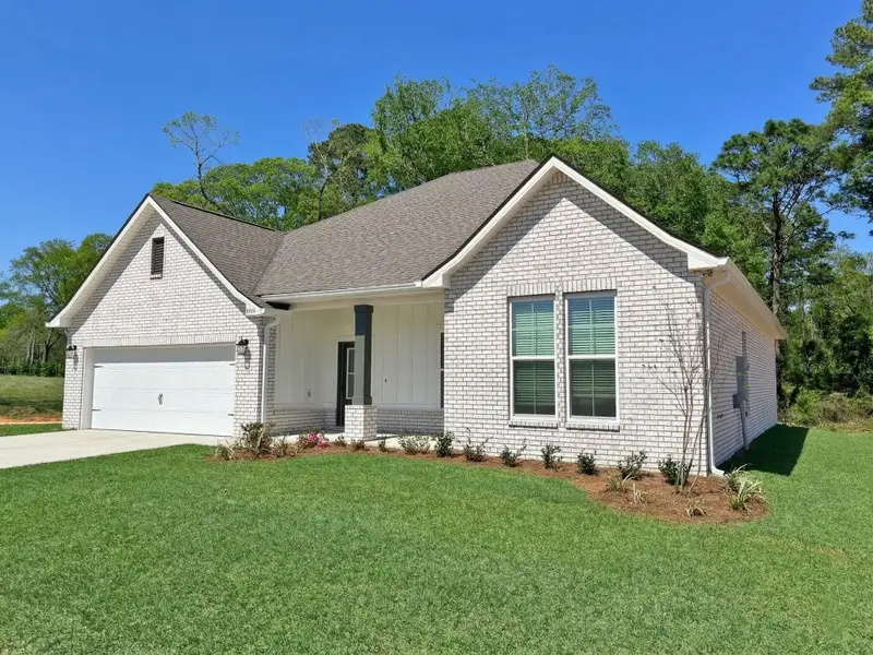 Front exterior of a new home in Houston Place, Crestview, FL, highlighting curb appeal (Image 1). Front exterior of a new home in Houston Place, Crestview, FL, highlighting curb appeal (Image 1).