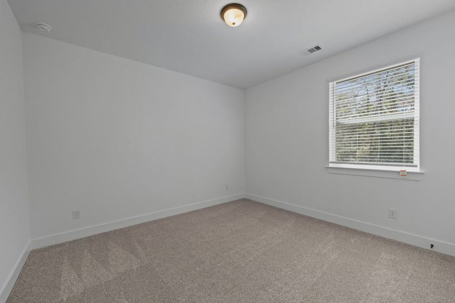 Spacious, unfurnished interior of a new home in The Woodlands Hills, Willis (Image 17).