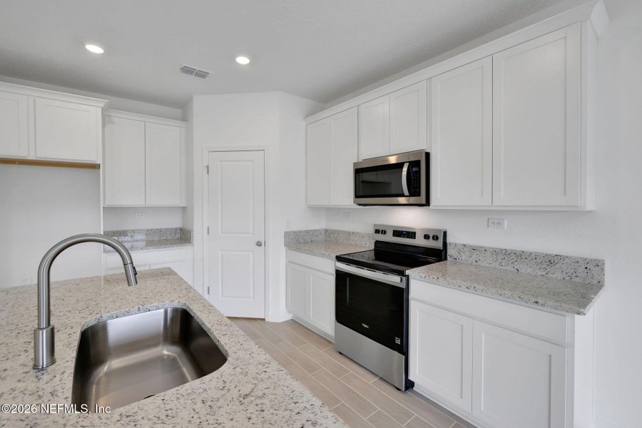 Furnished interior view inside a new home in Wilford Oaks, Orange Park (Image 8).