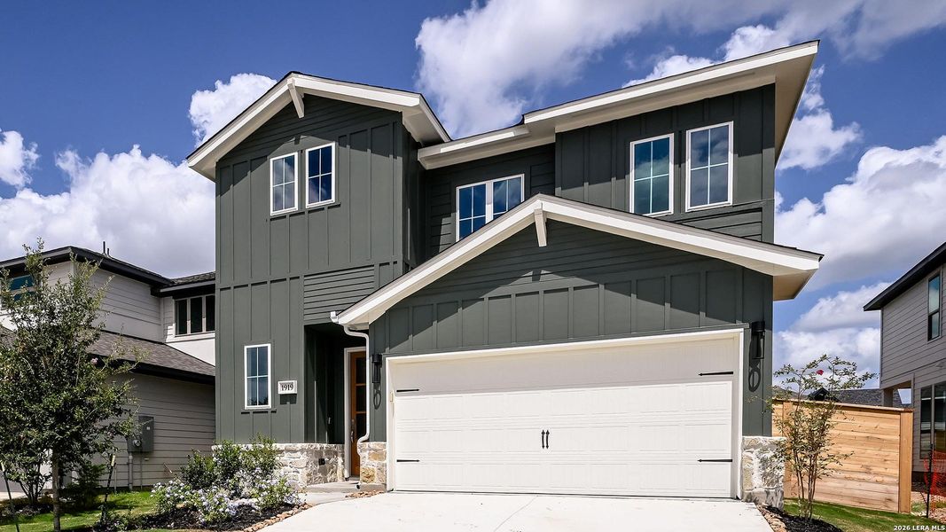 Front exterior of a new home in Solms Landing, New Braunfels, TX, highlighting curb appeal (Image 20). Front exterior of a new home in Solms Landing, New Braunfels, TX, highlighting curb appeal (Image 20).